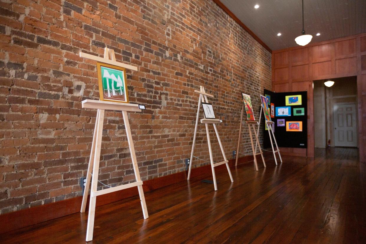 Works from local students are displayed at the Mt. Pleasant Record Art Gallery in Mt. Pleasant, Tenn., on Wednesday, Oct. 13, 2021.