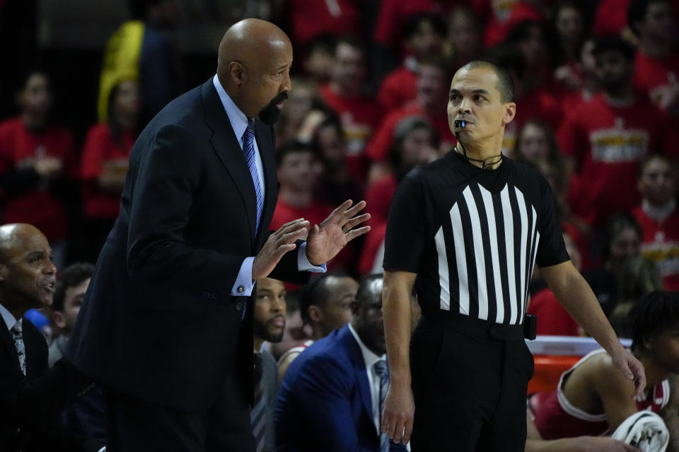 Indiana head coach Mike Woodson talks to an official during the first half of an NCCA college basketball game against Maryland, Tuesday, Jan. 31, 2023, in College Park, Md. (AP Photo/Julio Cortez)