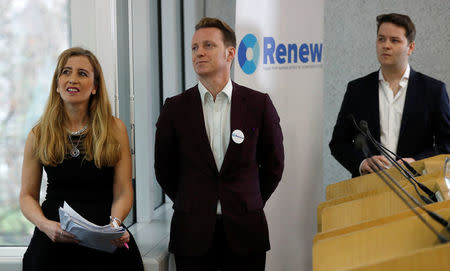 Sandra Khadhouri, together with fellow Renew party members James Clarke and James Torrance, speaks at the launch of the new political party in London, Britain, February 19, 2018. REUTERS/Peter Nicholls