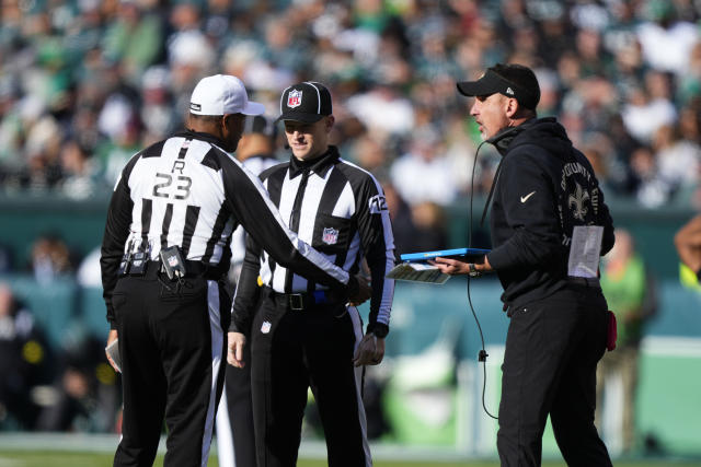 New Orleans, USA. August 13, 2023: New Orleans Saints Head Dennis Allen  encourages his players as they come off the field during NFL pre-season game  action between the New Orleans Saints and