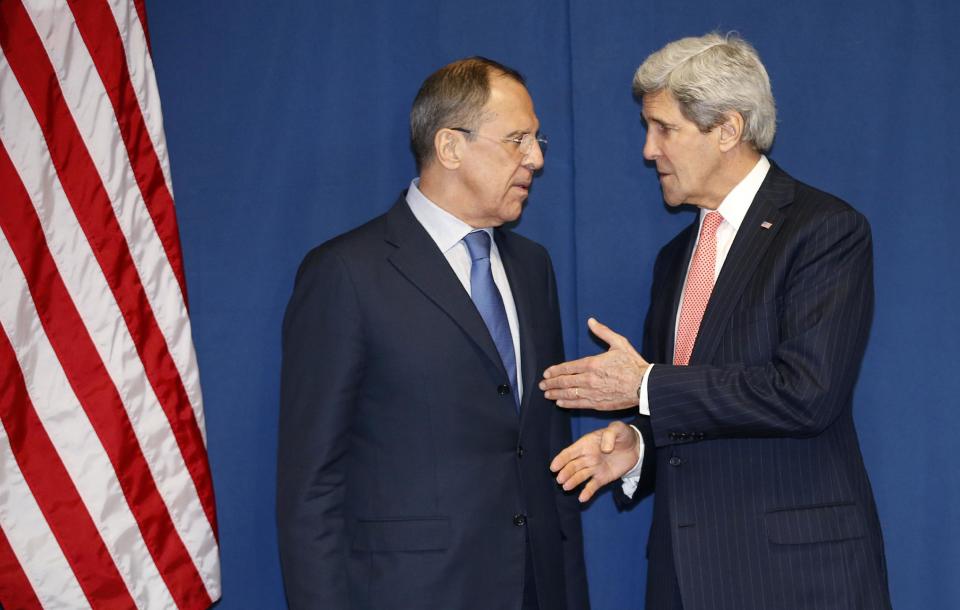 Secretary of State John Kerry talks with Russian Foreign Minister Sergey Lavrov during a meeting to discuss the Ukraine crisis, Thursday, March 6, 2014, at the Conference on International Support to Libya, in Rome. It is the second meeting in as many days between Kerry and Lavrov, who met in Paris on Wednesday to talk about the crisis over the crisis in Ukraine's Crimea Peninsula. (AP Photo/Kevin Lamarque, Pool)