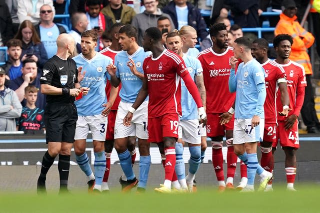 Rodri, third left, was shown a red card for violent decent in the 46th minute