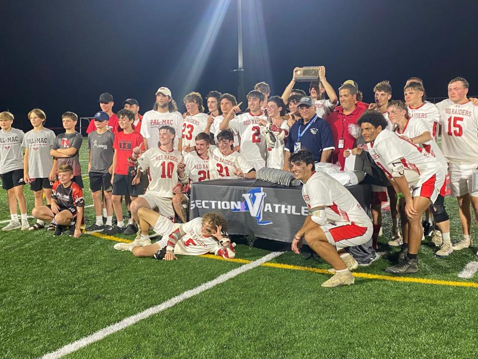 Palmyra-Macedon celebrates its 8-5 victory over Honeoye Falls-Lima for the Section V Class C boys lacrosse title on May 31, 2022.