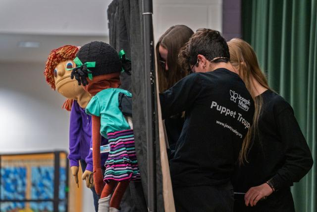 Volunteers with Joseph Maley Foundation's Westfield Middle School Puppet Troupe put on a puppet show about living with disabilities Monday, Nov. 14, 2022 at Washington Woods Elementary School in Westfield.