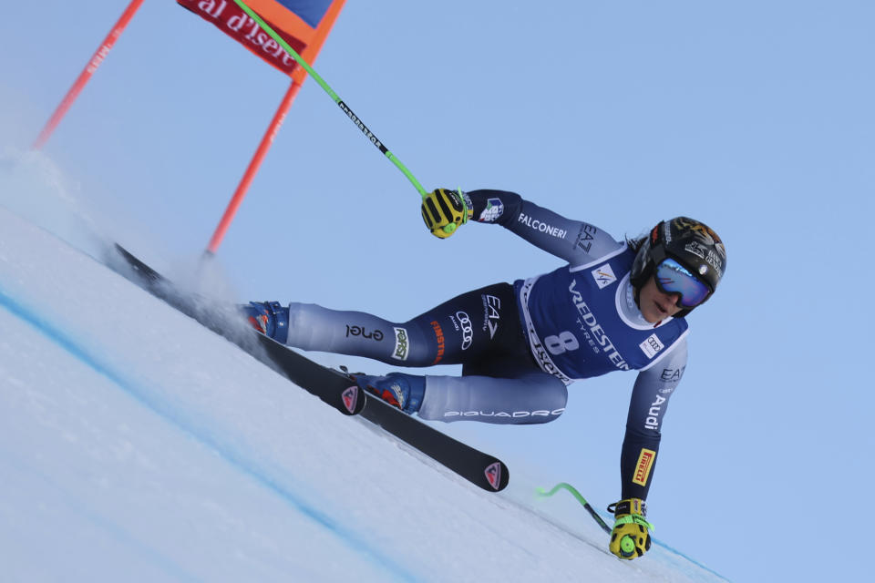 Italy's Federica Brignone speeds down the course during an alpine ski, women's World Cup Super G race, in Val d'Isere, France, Sunday, Dec. 17, 2023. (AP Photo/Marco Trovati)