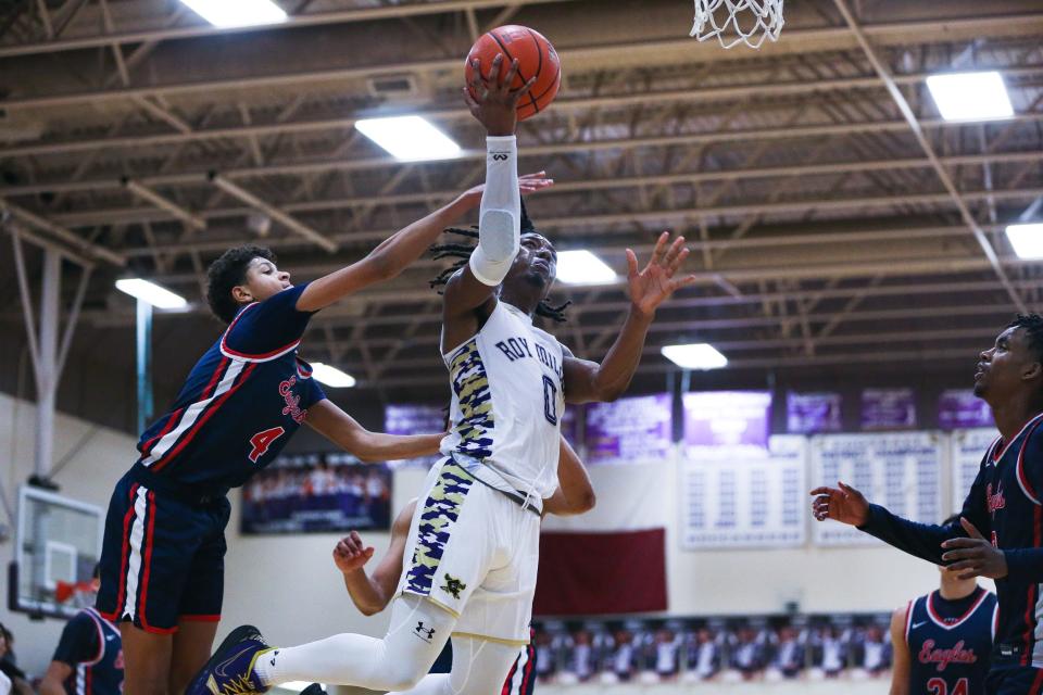 Miller's Lonnie Adkism (0) attempts a layup in a high school basketball game against Veterans Memorial on Tuesday, Dec. 6, 2022 at Miller High School in Corpus Christi, Texas. The Eagles won 69-65.