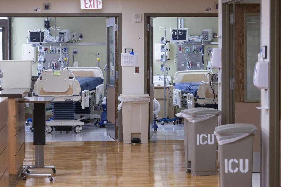 FILE - In this Thursday, April 9, 2020, file photo, the Intensive Care unit at the St. Vincent Medical Center building in Los Angeles is viewed. The empty hospital near downtown Los Angeles is being leased by the State of California to operate as a healthcare facility during the COVID-19 outbreak in Los Angeles County. Coronavirus cases have surged to record levels in the Los Angeles area, putting the nation's largest county in "an alarming and dangerous phase" that if not reversed could overwhelm Intensive Care units and usher in more sweeping closures, health officials said Wednesday, July 15, 2020. (AP Photo/Damian Dovarganes, File)