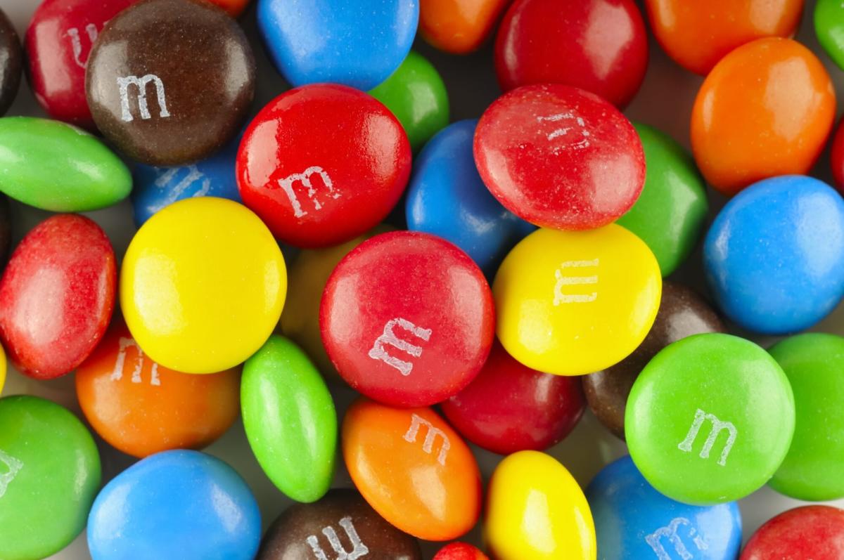 Man makes Guinness World Record after building tallest stack of M&M's