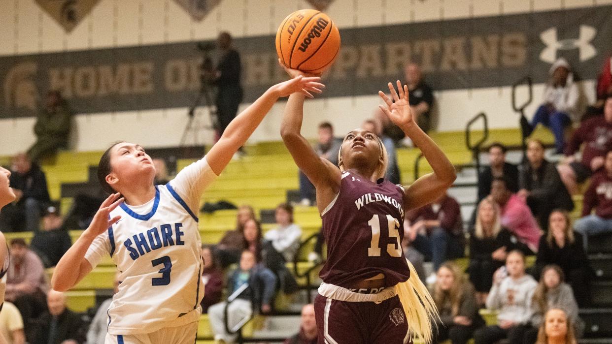 Wildwood's Kaliah Sumlin grabs a rebound in front of Shore's Kimi Sayson during the state Group 1 girls basketball semifinal playoff game played at Deptford High School on Wednesday, March 6, 2024.