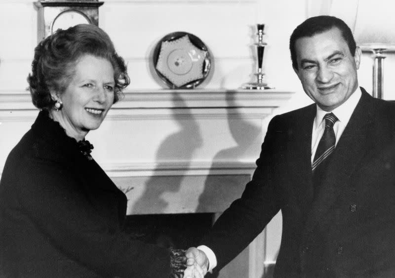 FILE PHOTO: Britain's Prime Minister Margaret Thatcher greets Egypt's President Hosni Mubarak inside 10 Downing Street, London