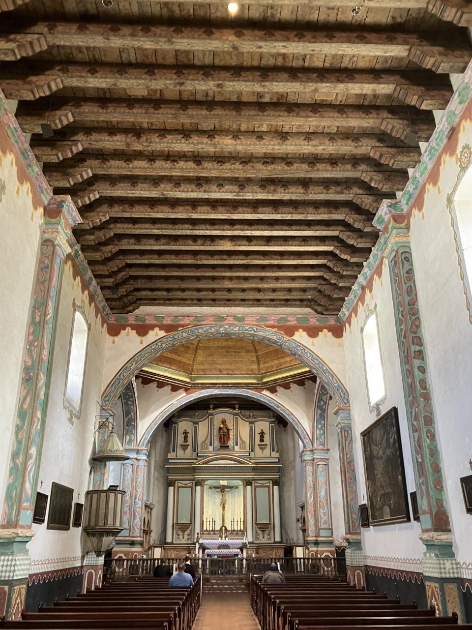 In Oceanside, Calif., Mission San Luis Rey, dating to 1798, is laid out in a cross-shaped design. The altar reflects a mix of classical and baroque architecture.