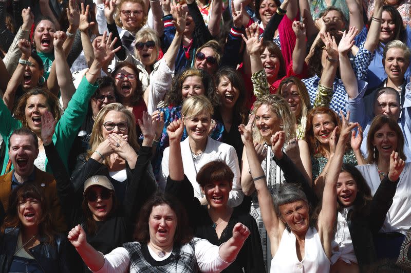 The 77th Cannes Film Festival - Group photo against violence towards women