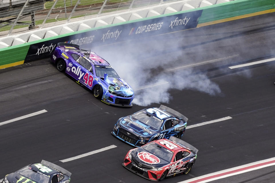 NASCAR Cup Series driver Alex Bowman (48) hits the wall during the NASCAR Cup Series auto race at Atlanta Motor Speedway, Sunday, July 10, 2022, in Hampton, Ga. (AP Photo/Bob Andres)