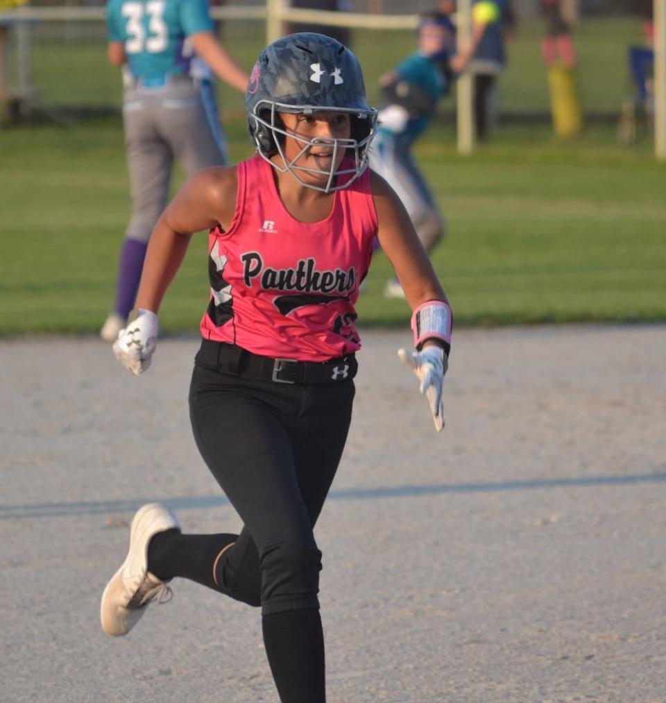 Marley Szymoniak of the Presque Isle Panthers heads for third base during a Chaos Clash game in Cheboygan last summer. Multiple Presque Isle Panthers' teams will be making the trip to Cheboygan for the Chaos Clash this weekend.