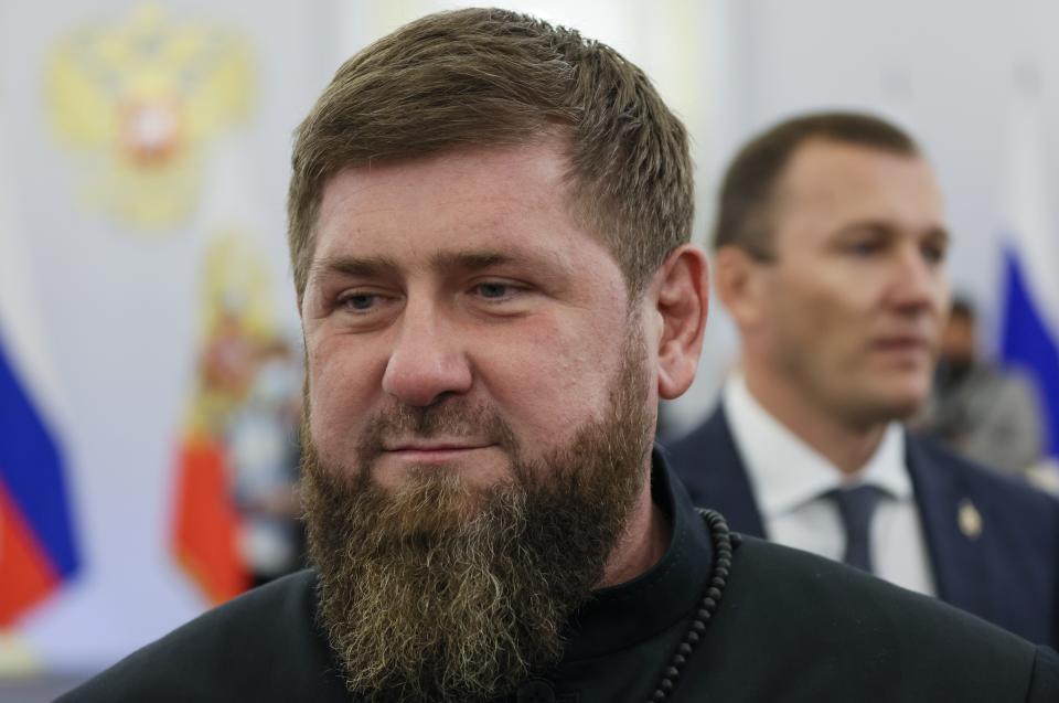 FILE - Chechnya's regional leader Ramzan Kadyrov arrives to attend a ceremony to sign the treaties for four regions of Ukraine to join Russia, at the Kremlin in Moscow, Friday, Sept. 30, 2022. Yevgeny Prigozhin has found a powerful ally in Chechnya's leader Ramzan Kadyrov, who deployed elite troops from the region to fight in Chechnya and shared his criticism of the military leadership and repeatedly assailed the Kremlin for being too soft and indecisive. (Mikhail Metzel, Sputnik, Kremlin Pool Photo via AP, File)