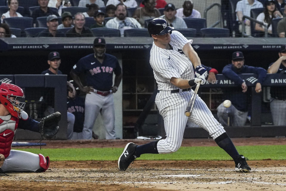 New York Yankees' DJ LeMahieu singles during the fourth inning of a baseball game against the Boston Red Sox, Sunday, June 11, 2023, in New York. (AP Photo/Bebeto Matthews)