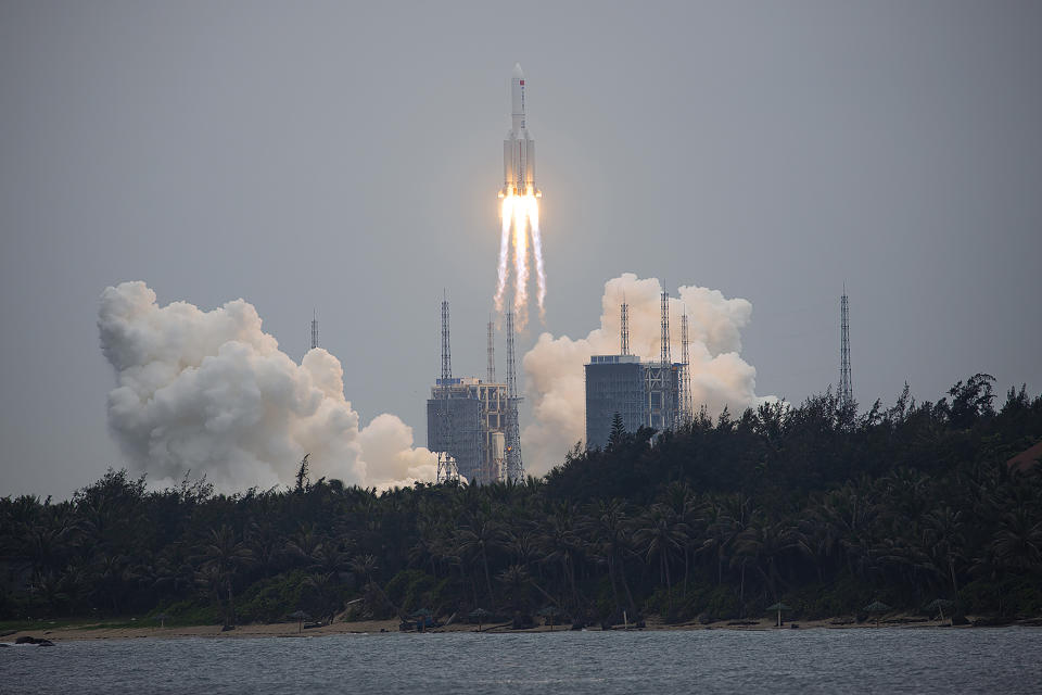 A Long March 5B rocket carrying a module for a Chinese space station lifts off from the Wenchang Spacecraft Launch Site in Wenchang in southern China's Hainan Province, Thursday, April 29, 2021. China has launched the core module on Thursday for its first permanent space station that will host astronauts long-term. (Chinatopix via AP)