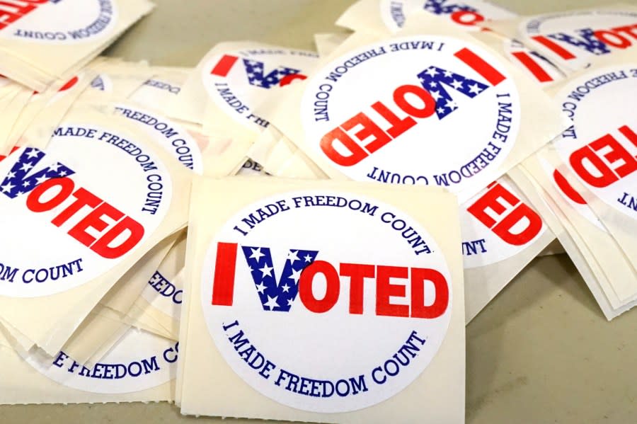 FILE – “I Voted” stickers are ready to be distributed to each person who filled out their ballot, Tuesday, Nov. 8, 2022, at a Brandon, Miss., precinct. Mississippi is violating the U.S. Constitution’s ban on cruel and unusual punishment by permanently stripping voting rights from people convicted of some felonies, a federal appeals court panel ruled in a split decision Friday, Aug. 4, 2023. (AP Photo/Rogelio V. Solis, File)