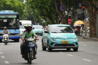 This photo shows Vinfast electric cars in traffic in Hanoi, Vietnam on June 6, 2024. Vietnamese automaker VinFast just can’t sell enough cars, so it's hoping its tiniest and cheapest car yet — a roughly 10-foot-long mini-SUV priced at $9,200 and called the VF3 — will become Vietnam's “national car" and win over consumers in Asian markets. (AP Photo/Hau Dinh)