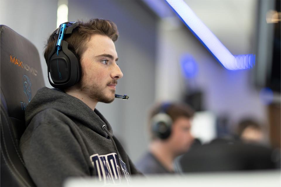 A student competes in an esports game at Dakota State University.
