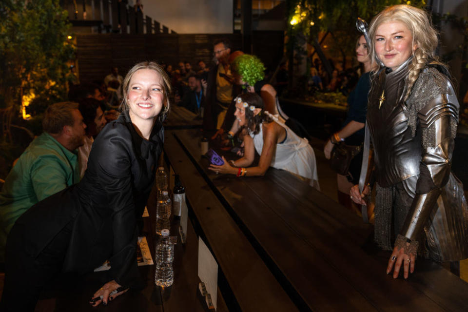 Lauren Stewart, dressed in cosplay as Galadriel, greets Welsh actress Morfydd Clark, who portrays Galadriel in The Lord of the Rings: The Rings of Power