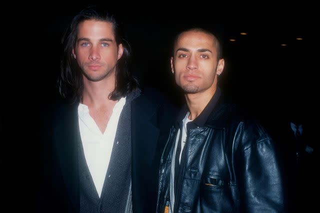 <p>Barry King/Alamy</p> Michael Easton (Left) and Kamar de los Reyes pictured in 1994.