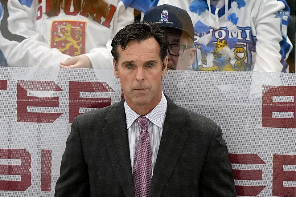 FILE - United States head coach David Quinn watches play during the Hockey World Championship bronze medal match between Czech Republic and USA in Tampere, Finland, on Sunday, May 29, 2022. The Sharks hired former New York Rangers coach David Quinn as their new head coach, the Sharks announced Tuesday, July 26, 2022. (AP Photo/Martin Meissner, File)