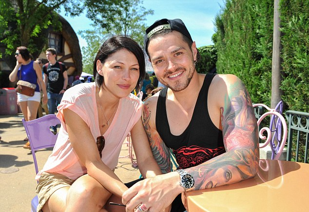Matt, pictured here with his wife Emma, is heavily tattooed.