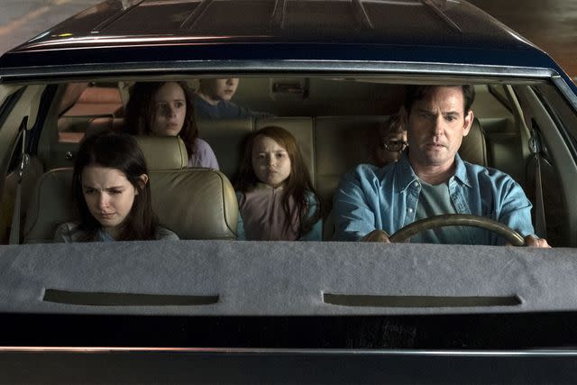 Steve Dietl/Netflix Mckenna Grace, Lulu Wilson, Paxton Singleton, Violet McGraw, Julian Hillard, and Henry Thomas on 'The Haunting of Hill House'