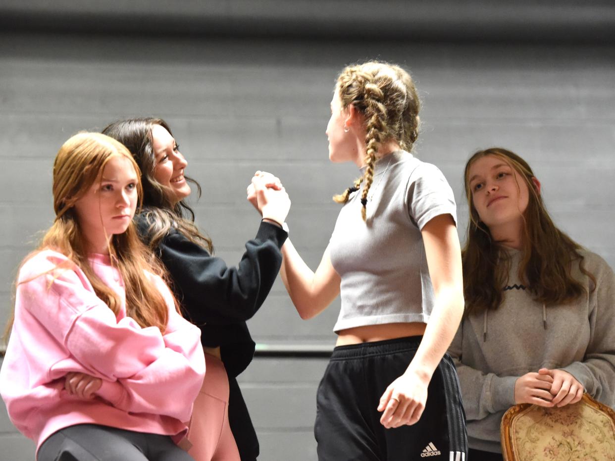 Wilson Memorial's Kaileigh Atkinson (Amy), from left, Mary McCoy (Beth), Quinn Franklin (Jo),  and Miley Thomas (Meg) during a rehearsal of the school's performance of "Little Women." The musical will be held Feb. 17-19.