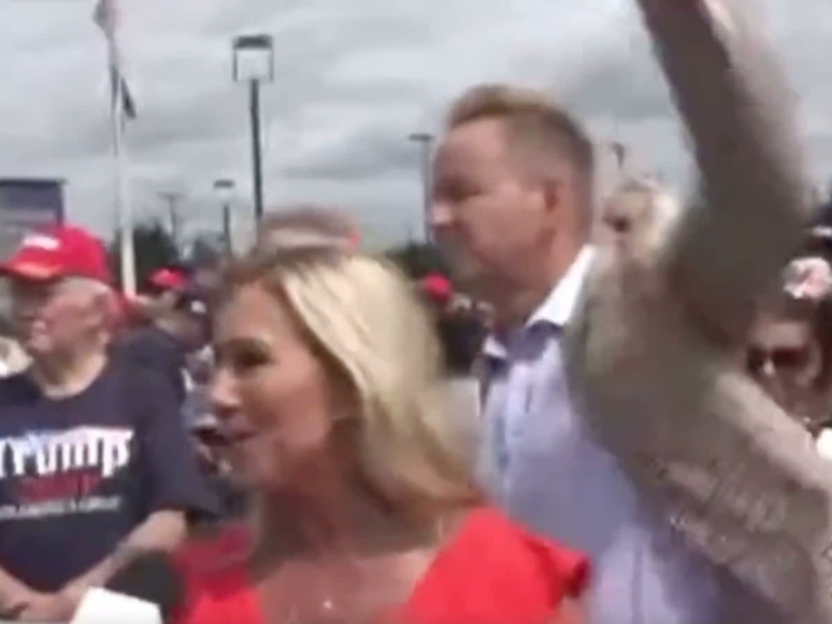 Republican Representative Marjorie Taylor Greene is left mid-sentence by a Right Side Broadcast News reporter when he sees GOP gubernatorial candidate Doug Mastriano arrive (screengrab/RSBN)