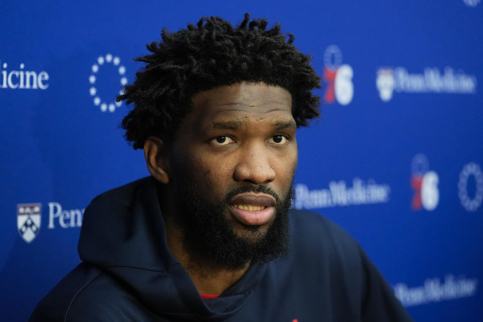 Philadelphia 76ers center Joel Embiid speaks with members of the media at the NBA basketball team's practice facility, Thursday, Feb. 29, 2024, in Camden, N.J. (AP Photo/Matt Rourke)