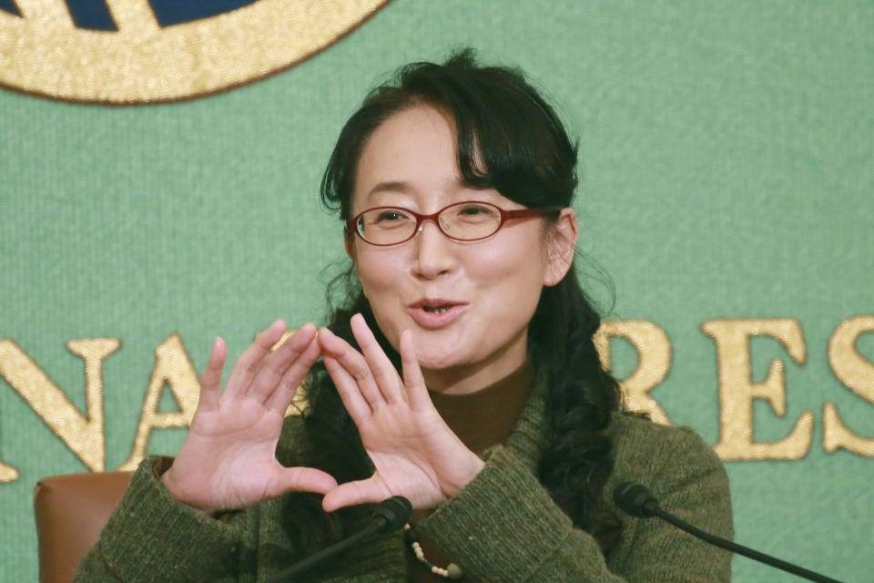 Japanese writer Yu Miri speaks during a news conference in Tokyo on Wednesday, Dec. 23, 2020. Miri's novel "Tokyo Ueno Station" has won the National Book Award 2020 for Translated Literature in the United States. (AP Photo/Koji Sasahara)