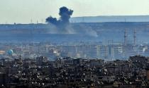 Smoke billows from the southern suburbs of Aleppo during fighting between regime forces and rebel fighters on December 3, 2016