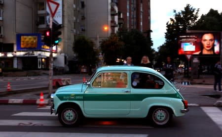 A converted supermini car Zastava 750, which has its combustion engine replaced with an electric one by BB Classic Cars, drives in Skopje