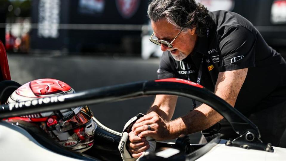 a man working out on a race car