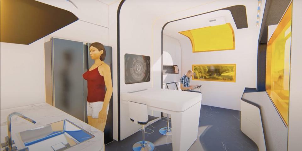 a rendering of the interior of the Cube Two X with yellow tinted windows, a person standing in the kitchen,