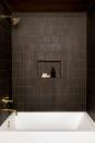 <p>This shower in a bathroom designed by Robert McKinley Studio is an intriguing juxtaposition between warm and edgy. The deep mocha handmade tiles are so much more impactful when the ceiling is painted the same color. The takeaway: Match the tiles to the ceiling paint!</p>