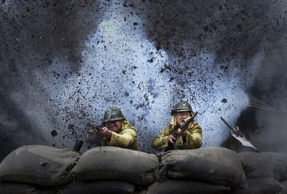 Actors&nbsp;film&nbsp;a battle scene in Fangyan, China, for "The Last Noble," a series set during&nbsp;the second Sino-Japanese War, on Aug. 13.