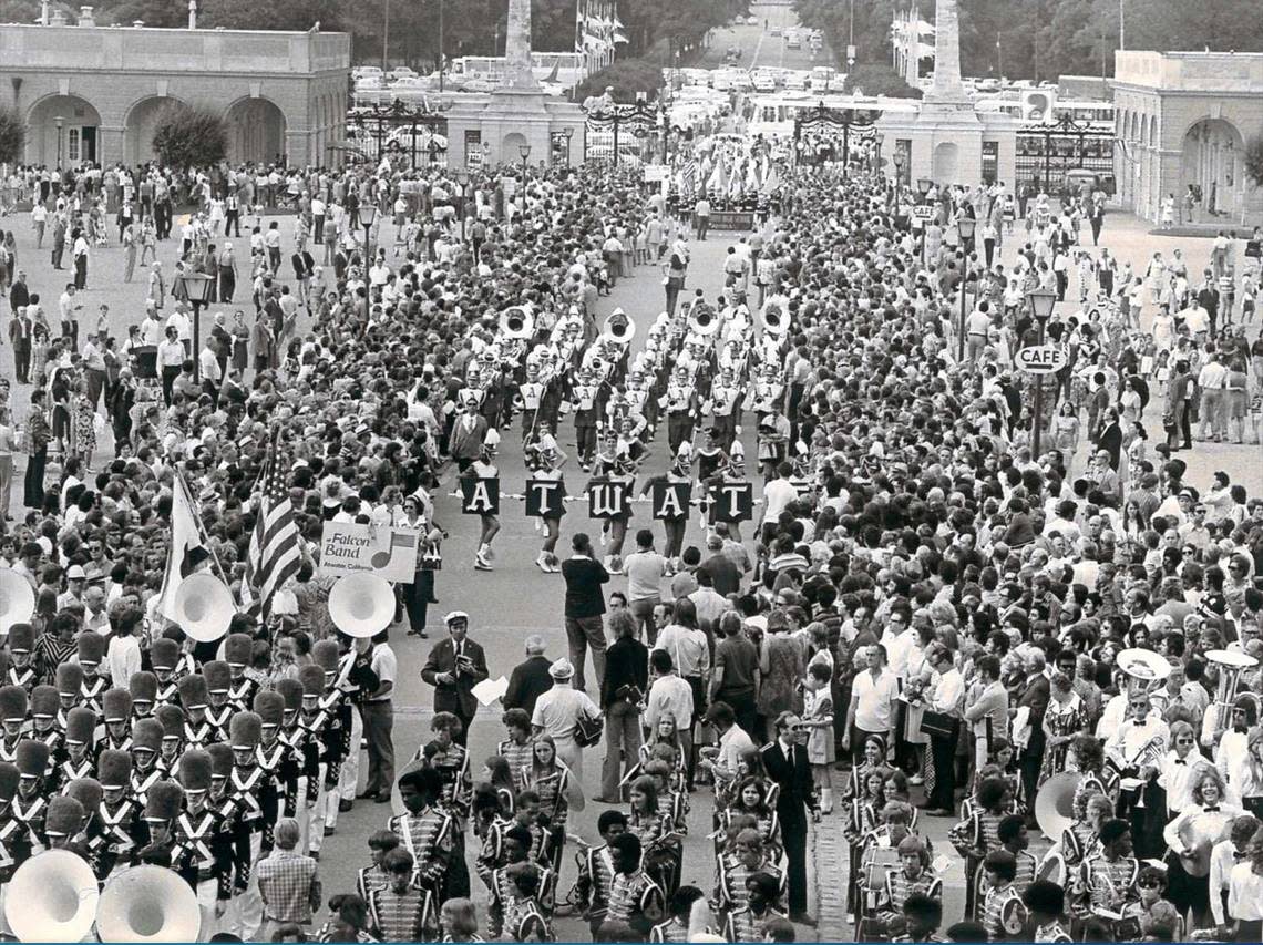 Atwater High School Falcon Band went to Austria in July 1973 to participate in the Youth and Music in Vienna Festival. The band marched through an Austrian crowd in front of Schoenbrunn Palace, headed by its letter carriers. The band won first place in its A.A. division in the marching competition. This photo was published on July 18, 1973.