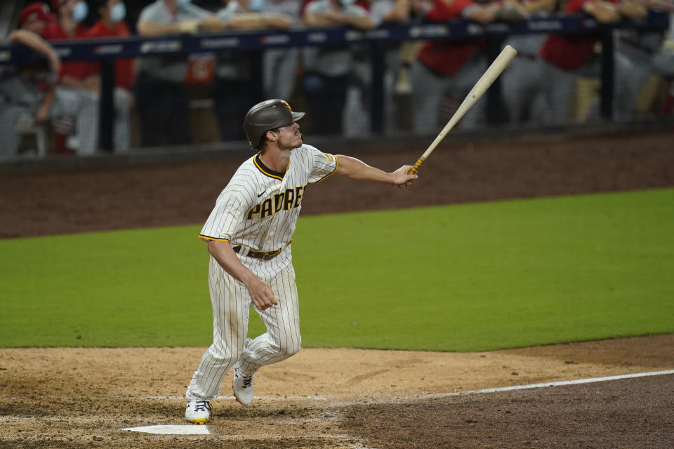 San Diego Padres' Wil Myers watches his two-run home run during the eighth inning of Game 2 of the team's National League wild-card baseball series against the St. Louis Cardinals, Thursday, Oct. 1, 2020, in San Diego. (AP Photo/Gregory Bull)