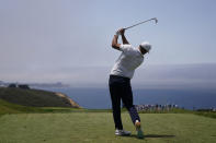 Brooks Koepka plays his shot from the third tee during the first round of the U.S. Open Golf Championship, Thursday, June 17, 2021, at Torrey Pines Golf Course in San Diego. (AP Photo/Jae C. Hong)