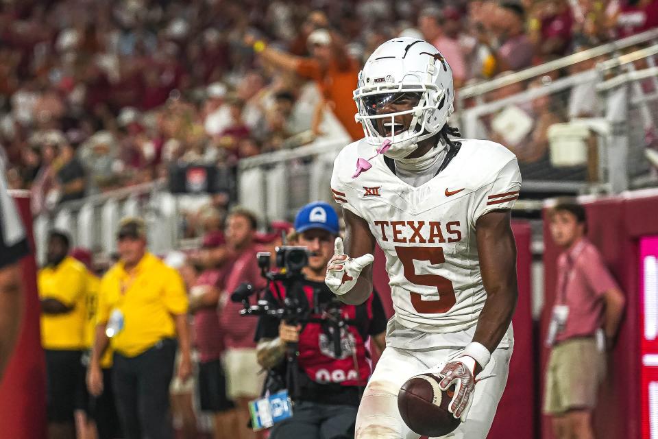 Texas wide receiver Adonai Mitchell celebrates a touchdown catch against Alabama. Through his first two games, the Georgia transfer already has three touchdown catches.