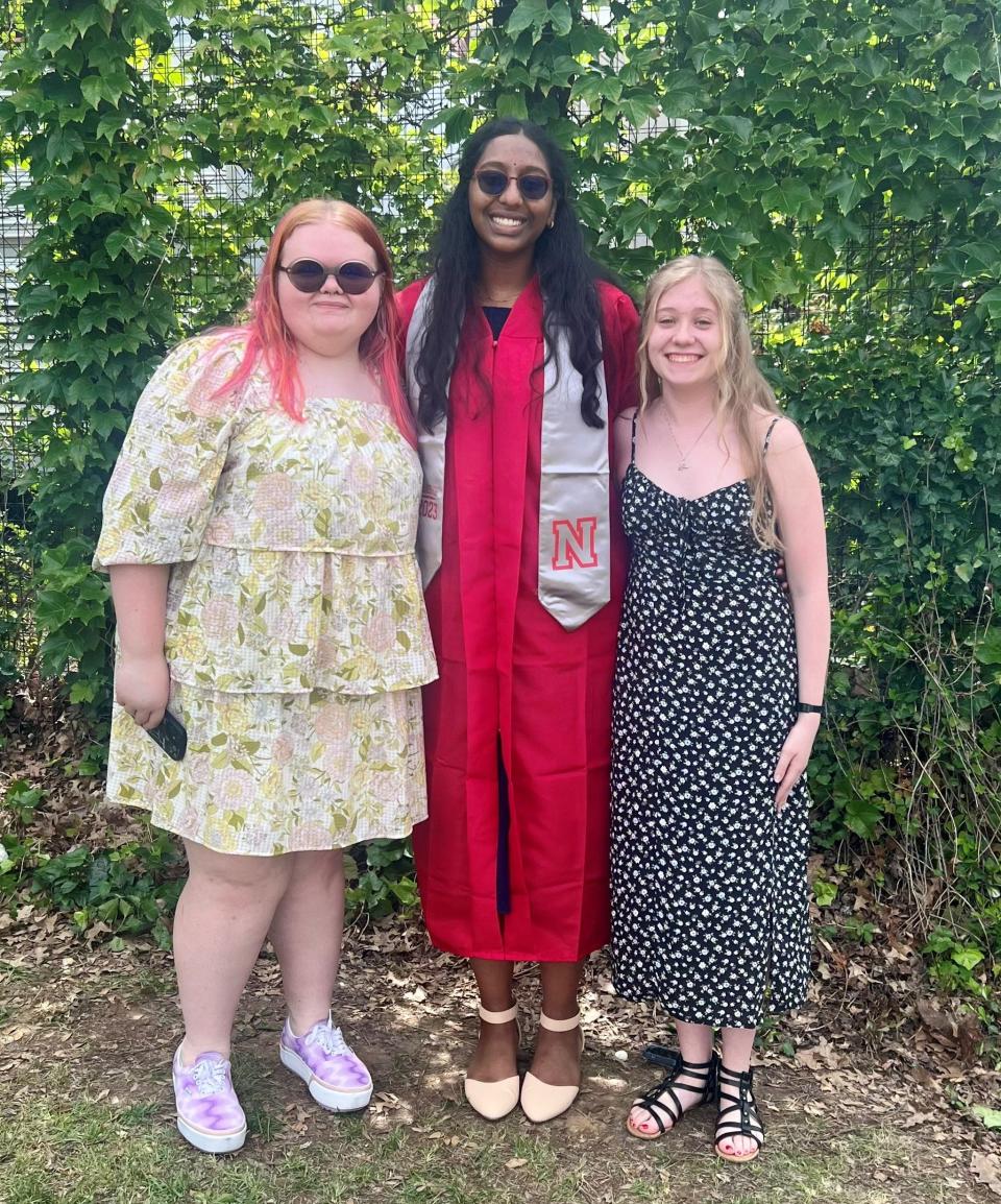 Nixa High School students Deliliah Neff, a senior, Meghana Nakkanti, a 2023 graduate, and Thomasina Brown, a senior, at the graduation ceremony.