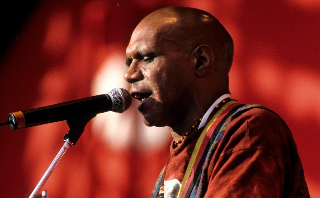 Archie Roach performing at the Melbourne Cricket Ground in 1998 - Martin Philbey/Getty Images