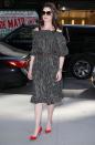 <p>Anne rocked a full vintage look featuring a printed Givenchy dress, Gucci belt and bright red Louboutins.<br><i>[Photo: FameFlynet]</i> </p>