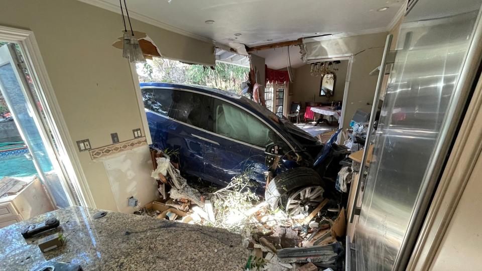 Tesla Vaults Over Pool And Crashes Into House