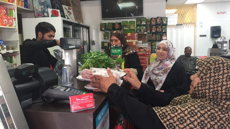 Circle of giving among Syrian refugees helps launch new halal shop