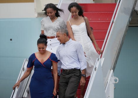 BOURNE, MA - AUGUST 6: President Barack Obama, First Lady Michelle Obama, and their daughters, Sasha (back left) and Malia, step off Air Force One at Joint Base Cape Cod to take Marine One to Martha’s Vineyard for a vacation, Aug. 6, 2016. It is Obama’s seventh time vacationing on the island as president. - Photo: Timothy Tai for The Boston Globe (Getty Images)