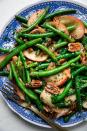 <p>This side dish tosses together green beans with slices of a honeycrisp apple for a delightful flavor combo.</p><p>Get the <strong><a href="https://themodernproper.com/green-beans-with-apples-and-sage-butter" rel="nofollow noopener" target="_blank" data-ylk="slk:Green Beans with Apples and Sage Butter recipe;elm:context_link;itc:0;sec:content-canvas" class="link ">Green Beans with Apples and Sage Butter recipe</a></strong> at The Modern Proper. </p><p><a class="link " href="https://www.amazon.com/Happy-Belly-Pecan-Halves-16/dp/B089HFR93L?tag=syn-yahoo-20&ascsubtag=%5Bartid%7C10070.g.2641%5Bsrc%7Cyahoo-us" rel="nofollow noopener" target="_blank" data-ylk="slk:Shop Pecans;elm:context_link;itc:0;sec:content-canvas">Shop Pecans</a></p>
